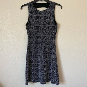 Black, silver, and white sparkly dress.